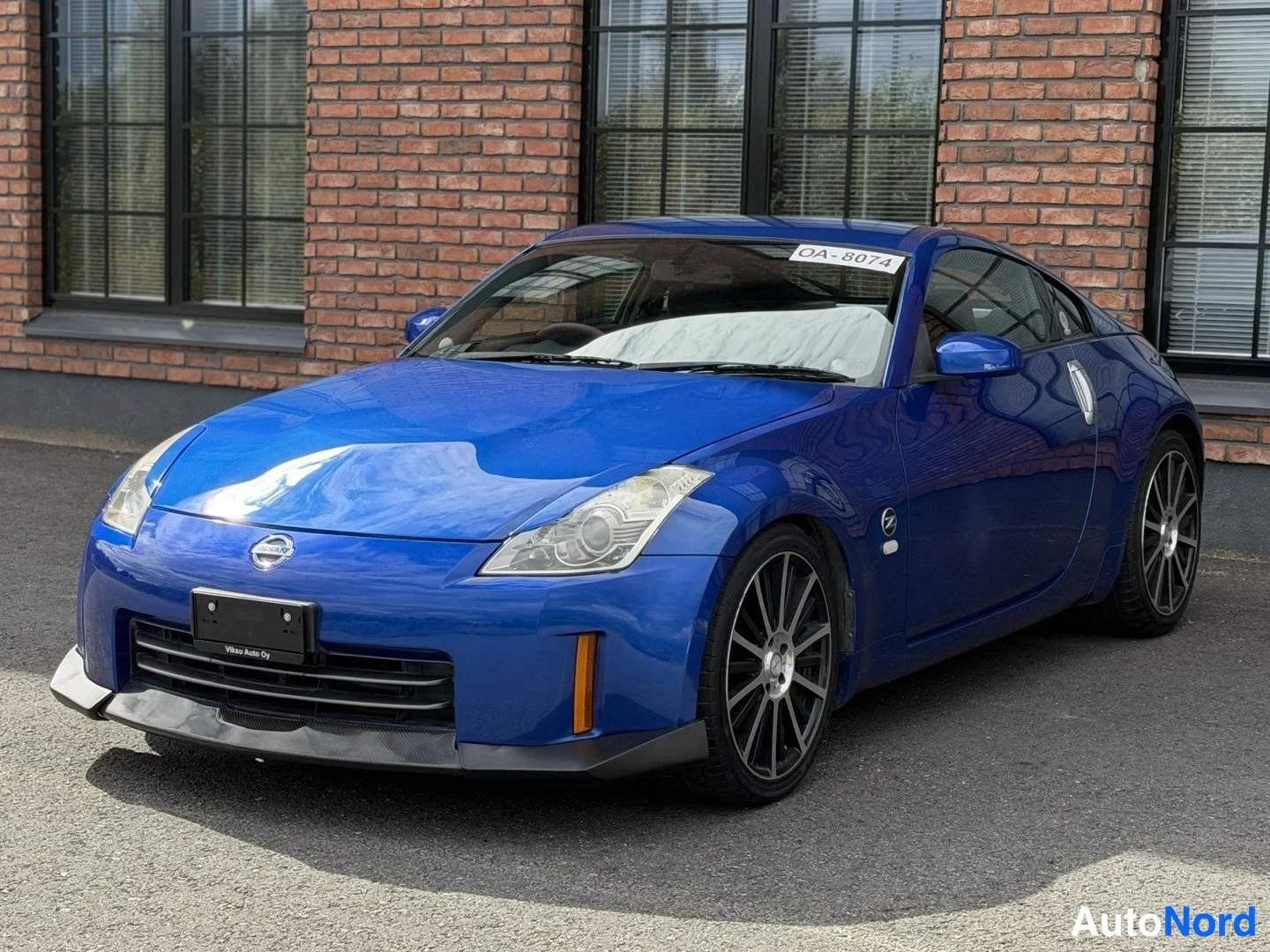 Blue Nissan 350Z 2007, front three-quarter, nose to the left, photo 2
