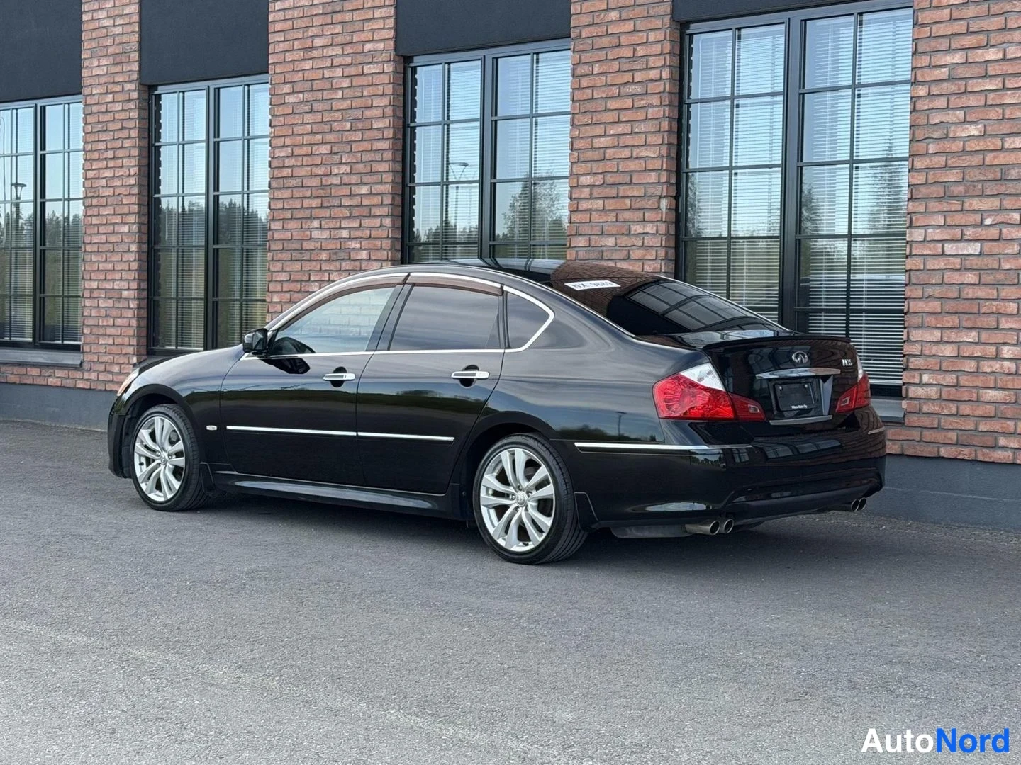 Black Nissan Fuga 2008, rear three-quarter, photo 8