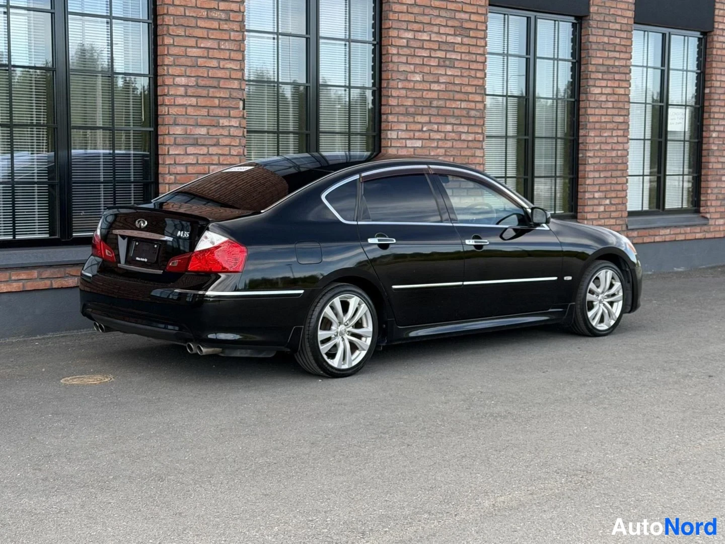 Black Nissan Fuga 2008, rear three-quarter, photo 9