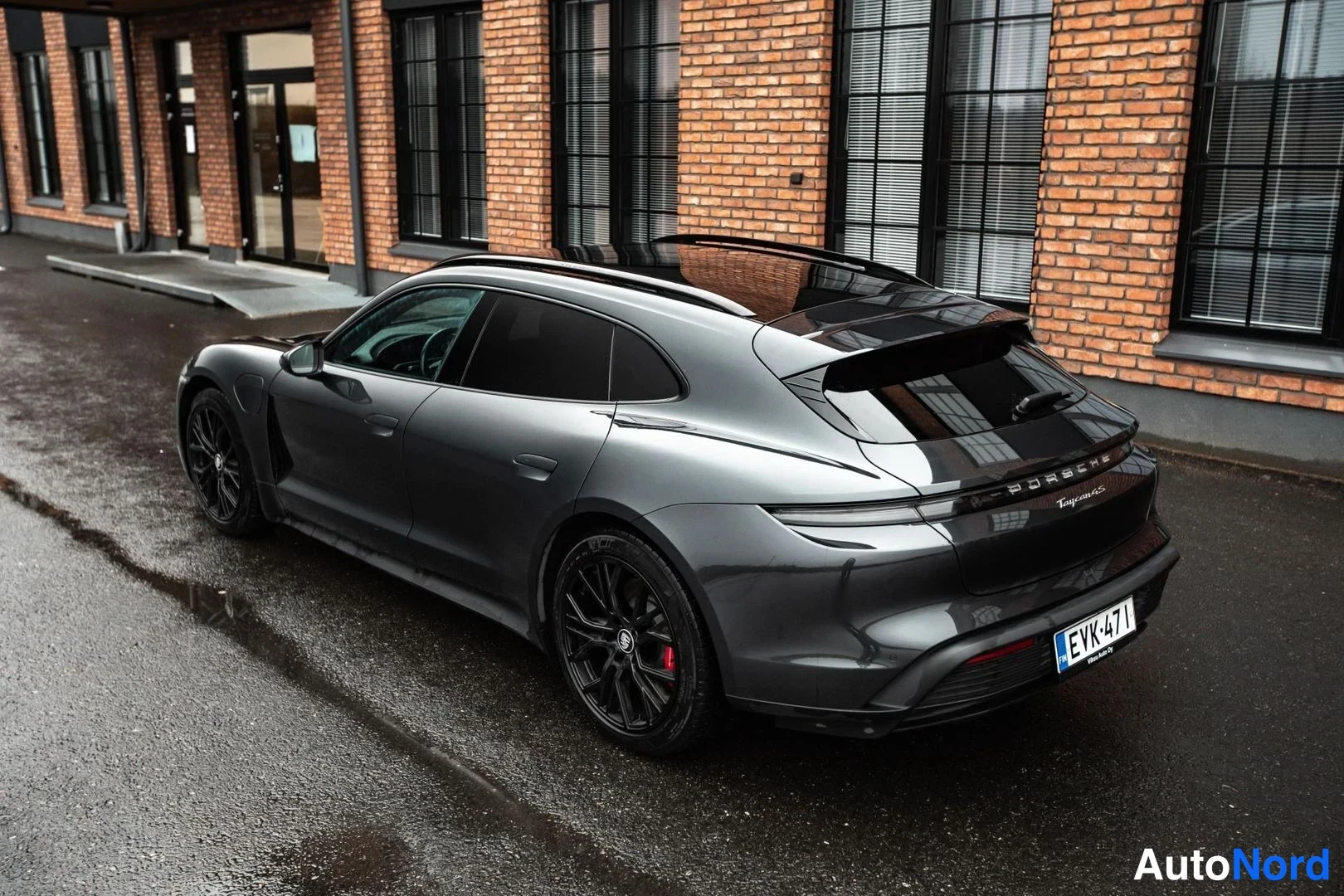 Grey Porsche Taycan 2023, rear three-quarter, photo 10