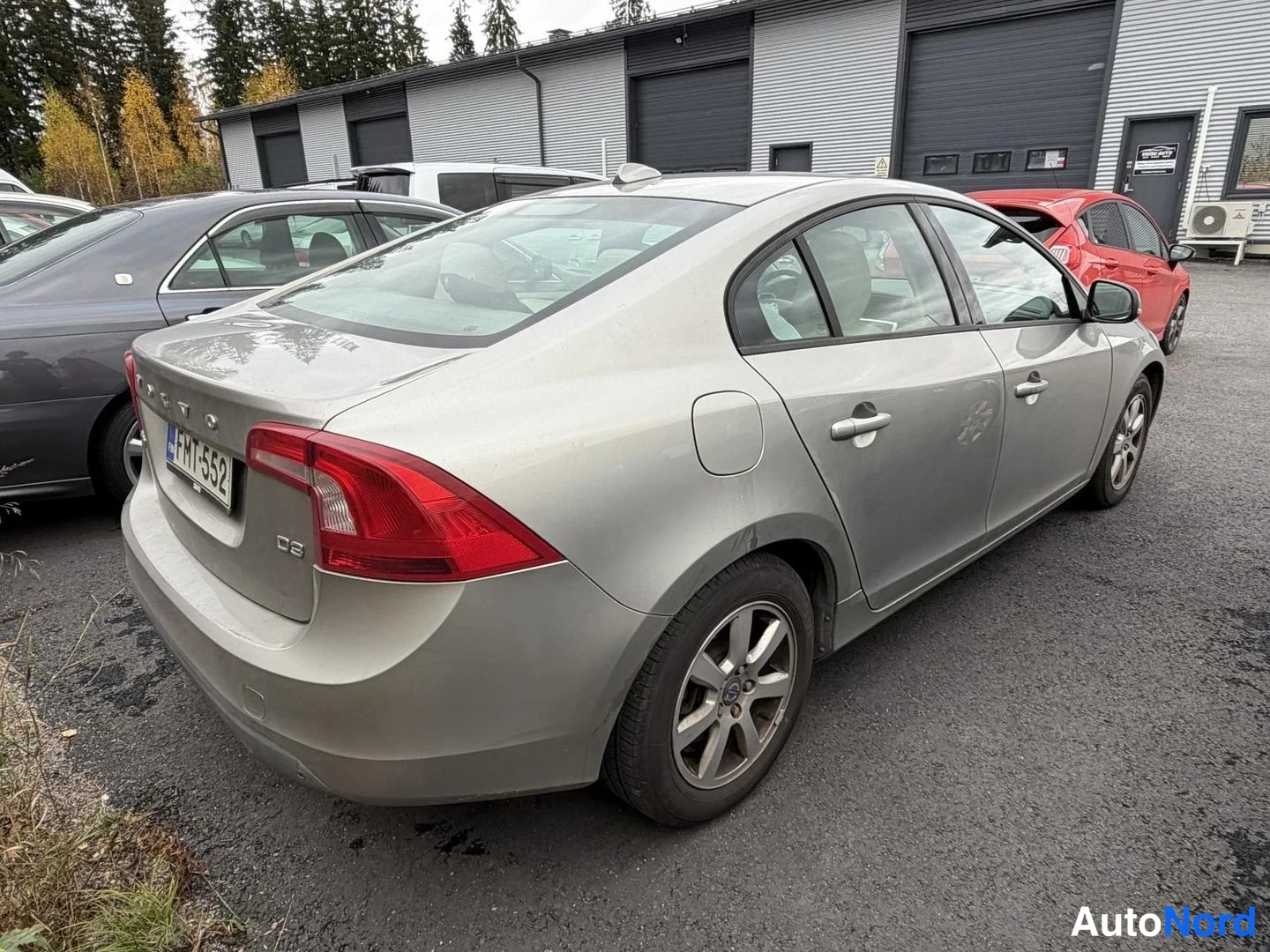 Silver Volvo S60 2010, rear three-quarter, photo 2