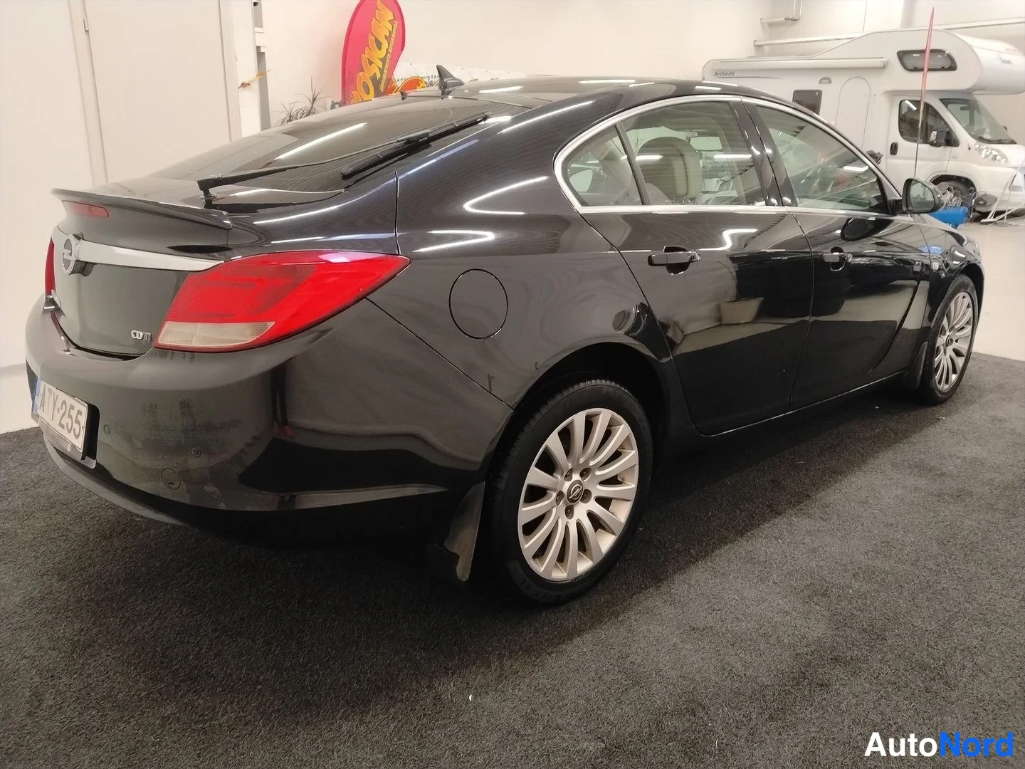 Black Opel Insignia 2009, rear three-quarter, photo 5