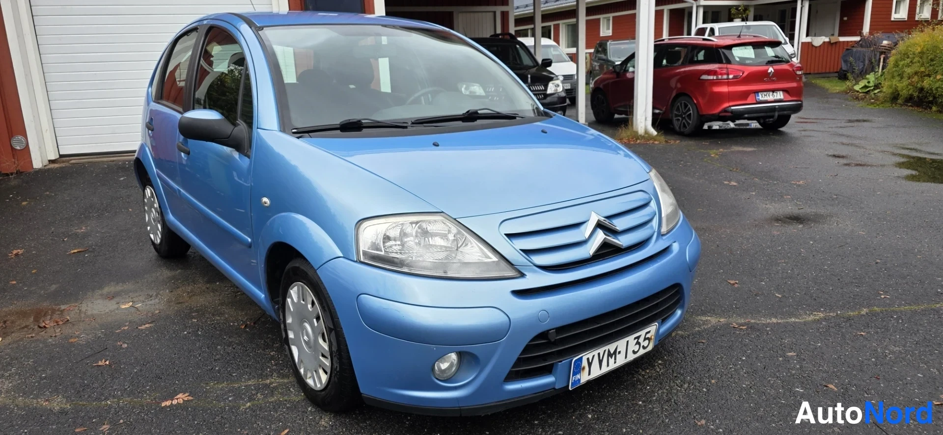 Blue Citroen C3 2008, front three-quarter, nose to the right, photo 4