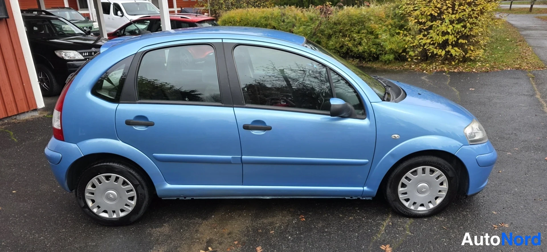 Blue Citroen C3 2008, front three-quarter, nose to the right, photo 3