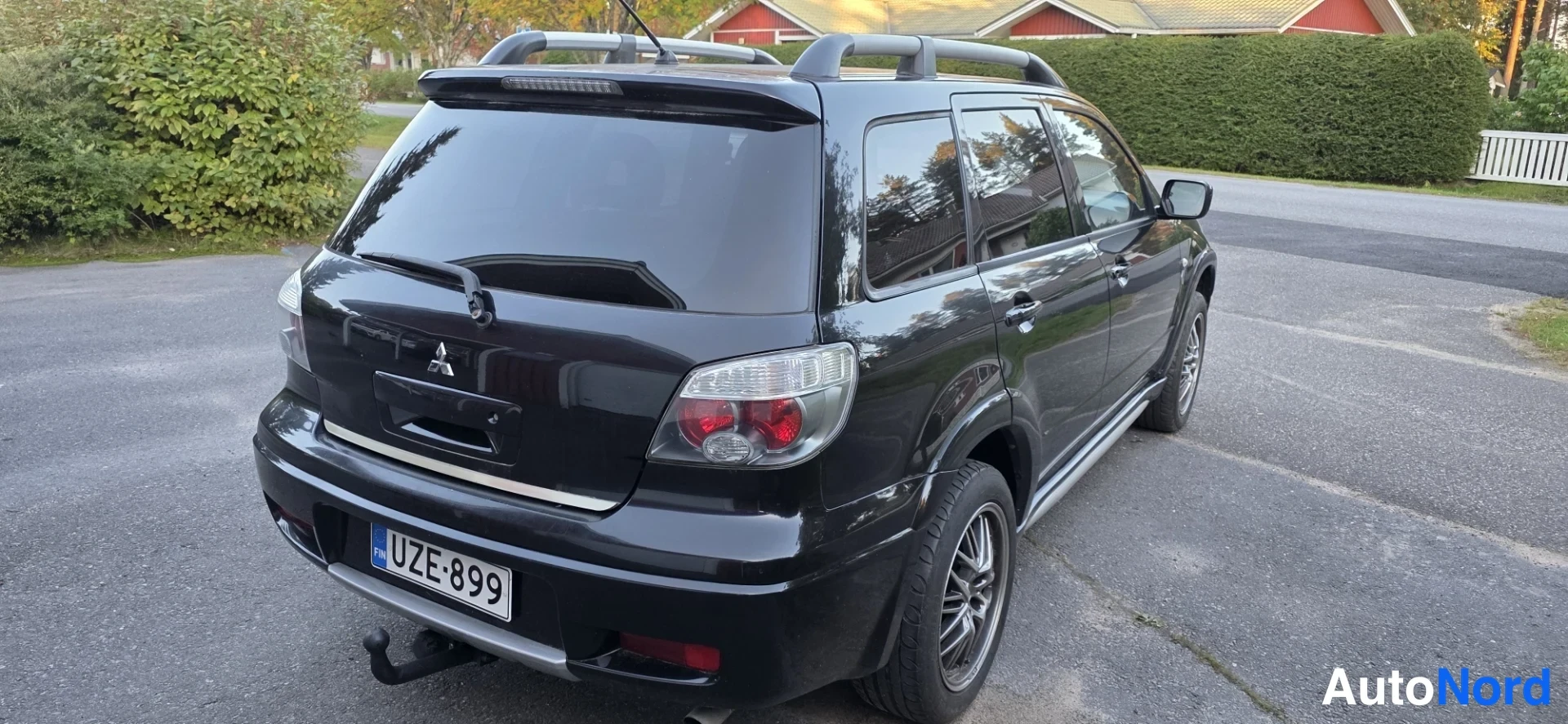 Black Mitsubishi Outlander 2006, rear three-quarter, photo 6