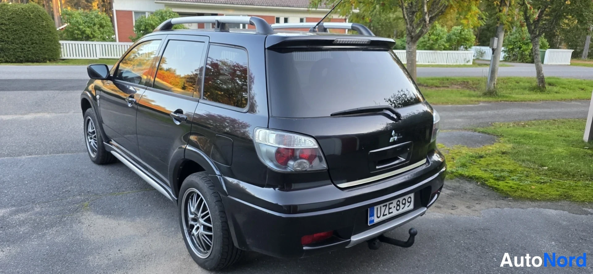 Black Mitsubishi Outlander 2006, rear three-quarter, photo 7