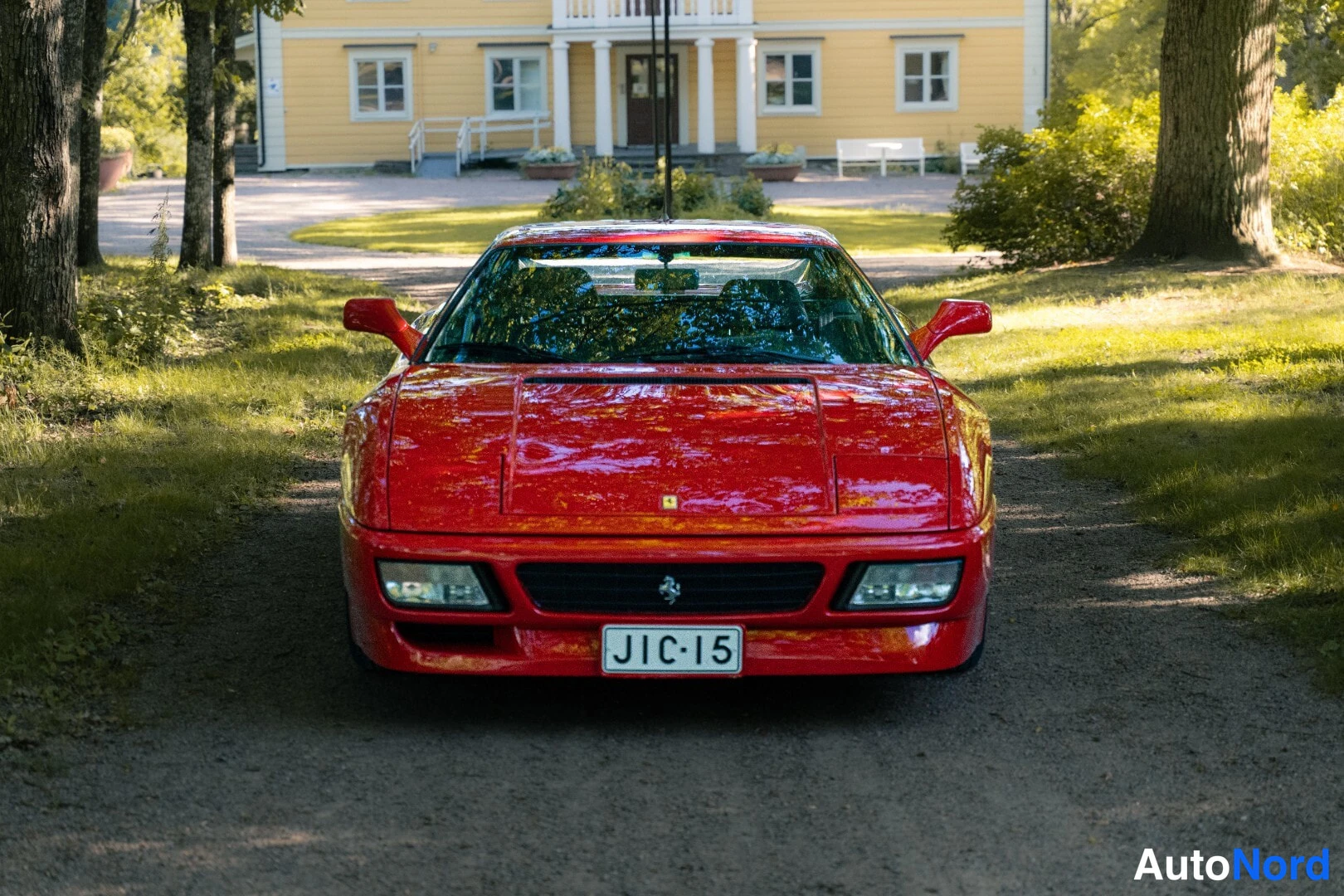 Red Ferrari 348 1991, front, photo 4