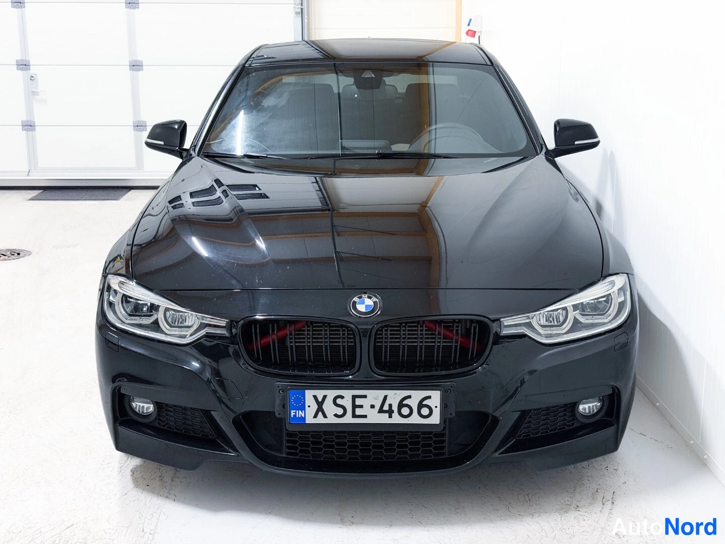 Black BMW 330e 2017, front, photo 3
