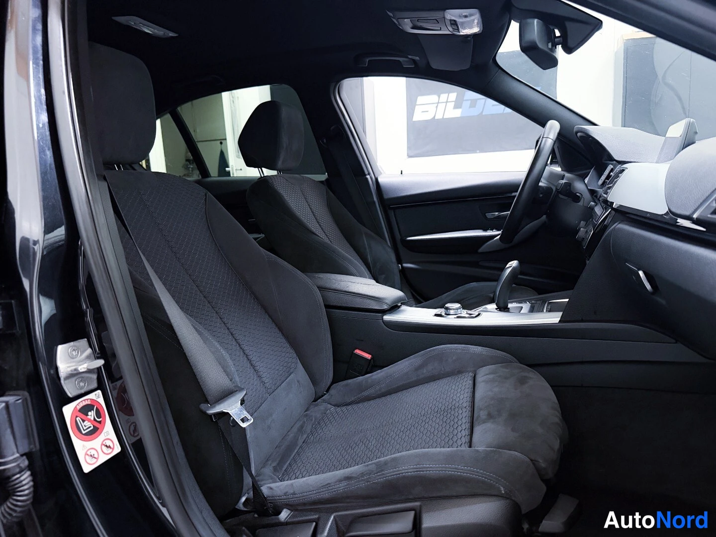 Black BMW 330e 2017, front seats, photo 10
