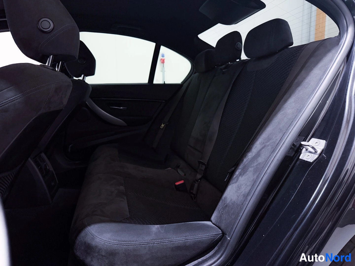 Black BMW 330e 2017, rear seats, photo 11