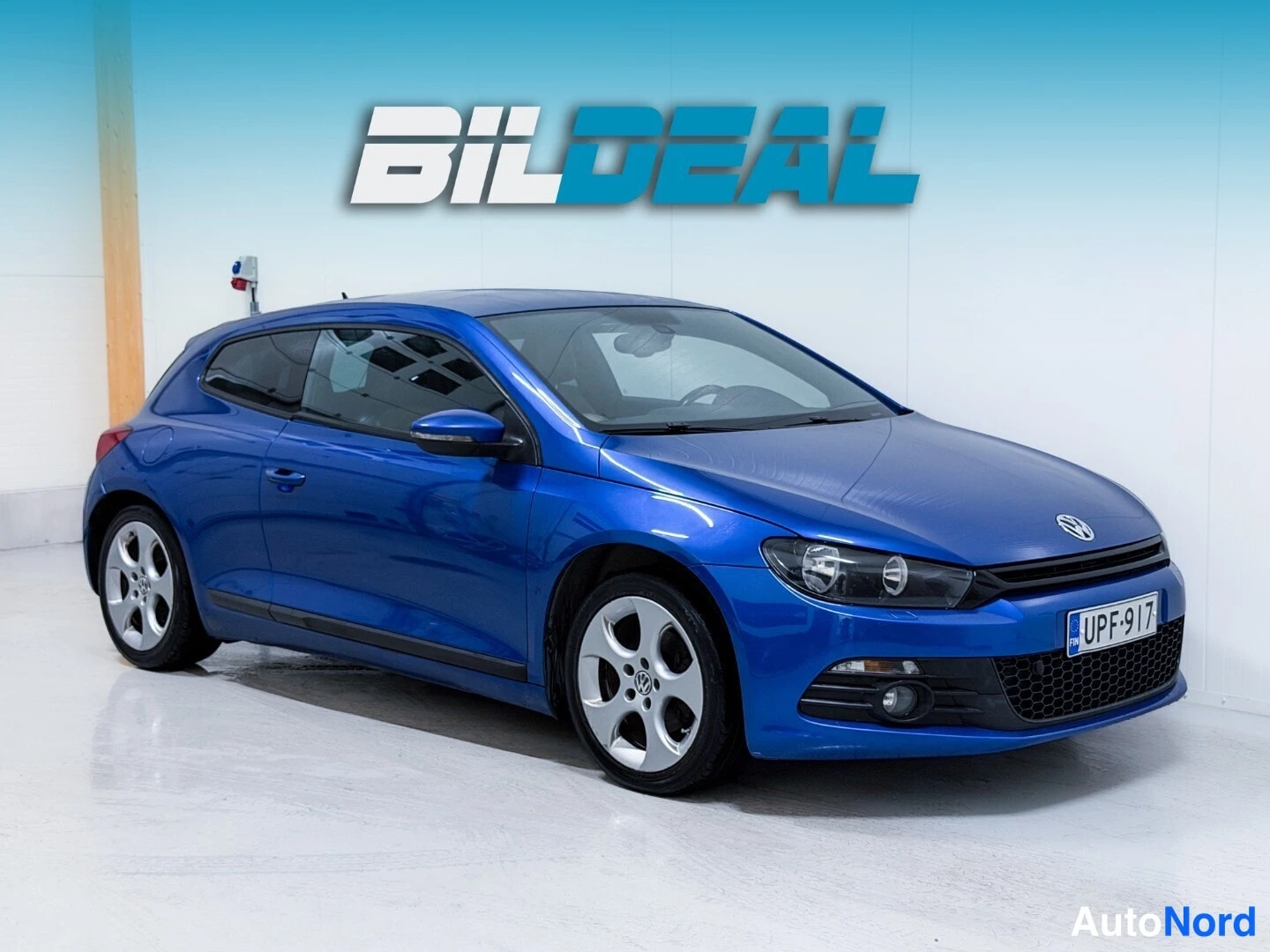 Blue Volkswagen Scirocco 2011, front three-quarter, nose to the right, photo 2