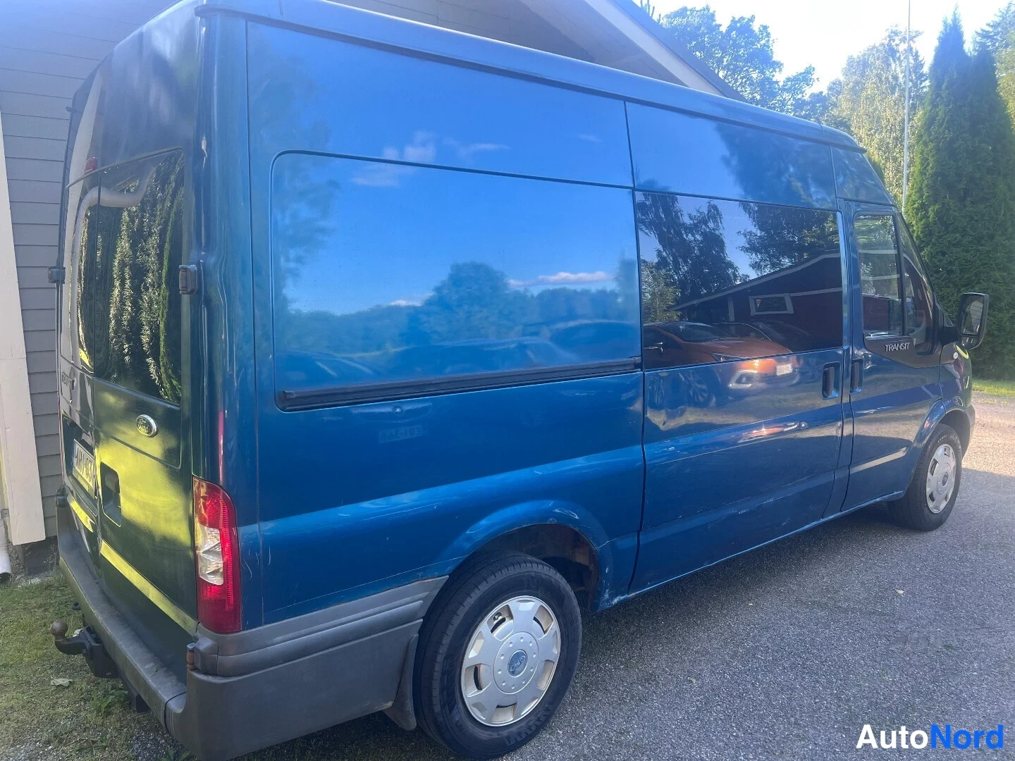 Blue Ford Transit 2007, rear three-quarter, photo 3
