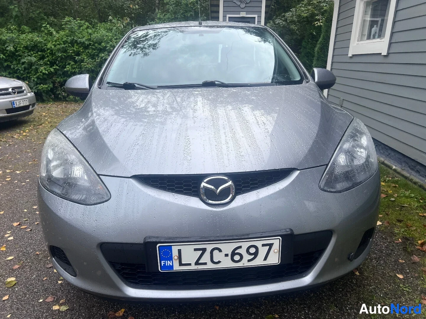 Grey Mazda 2 2010, front, photo 2