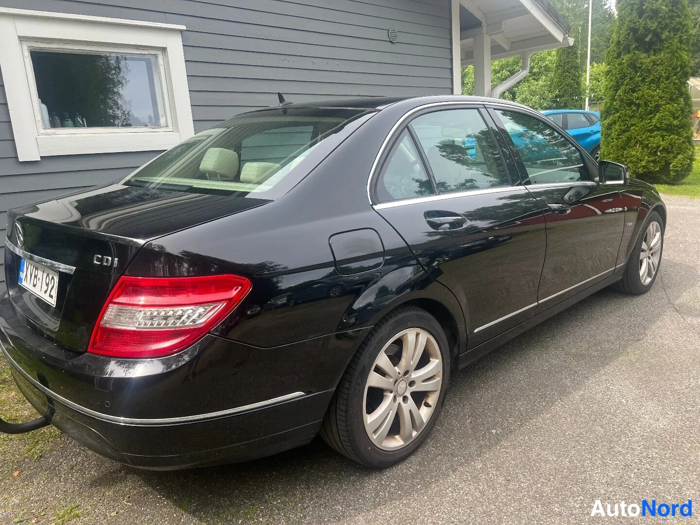 Black Mercedes-Benz C 200 CDI 2010, rear three-quarter, photo 3