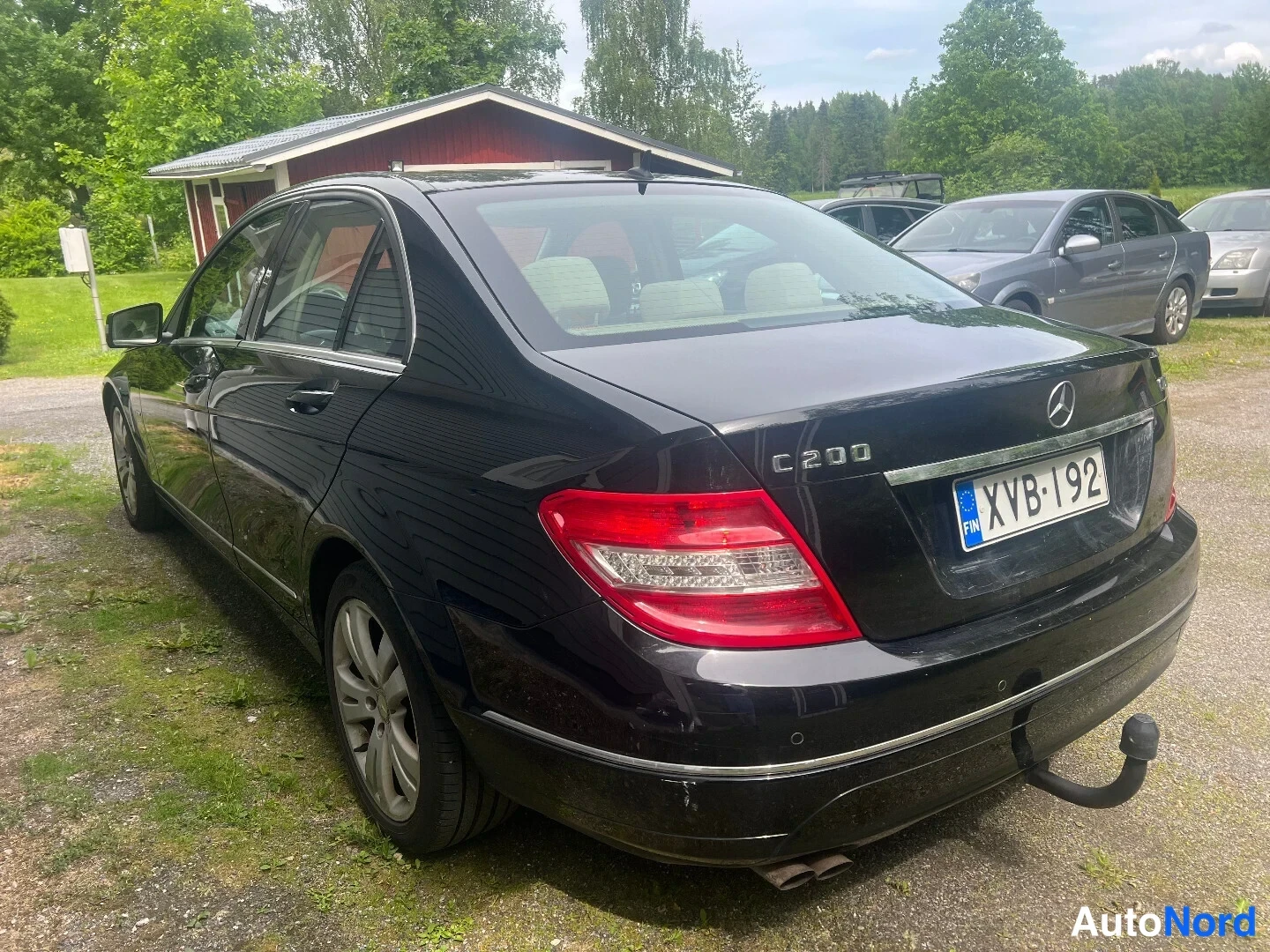Black Mercedes-Benz C 200 CDI 2010, rear three-quarter, photo 4