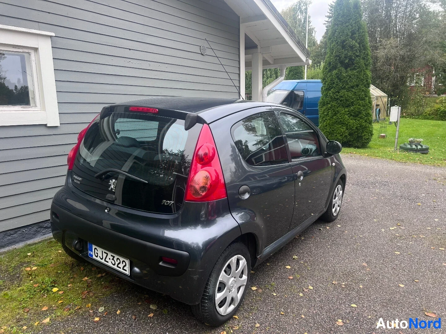 Grey Peugeot 107 2011, rear three-quarter, photo 4