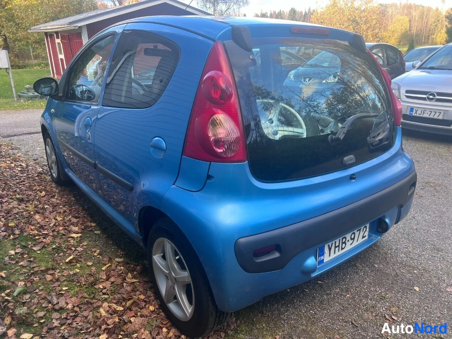 Blue Peugeot 107 2008, rear three-quarter, photo 4