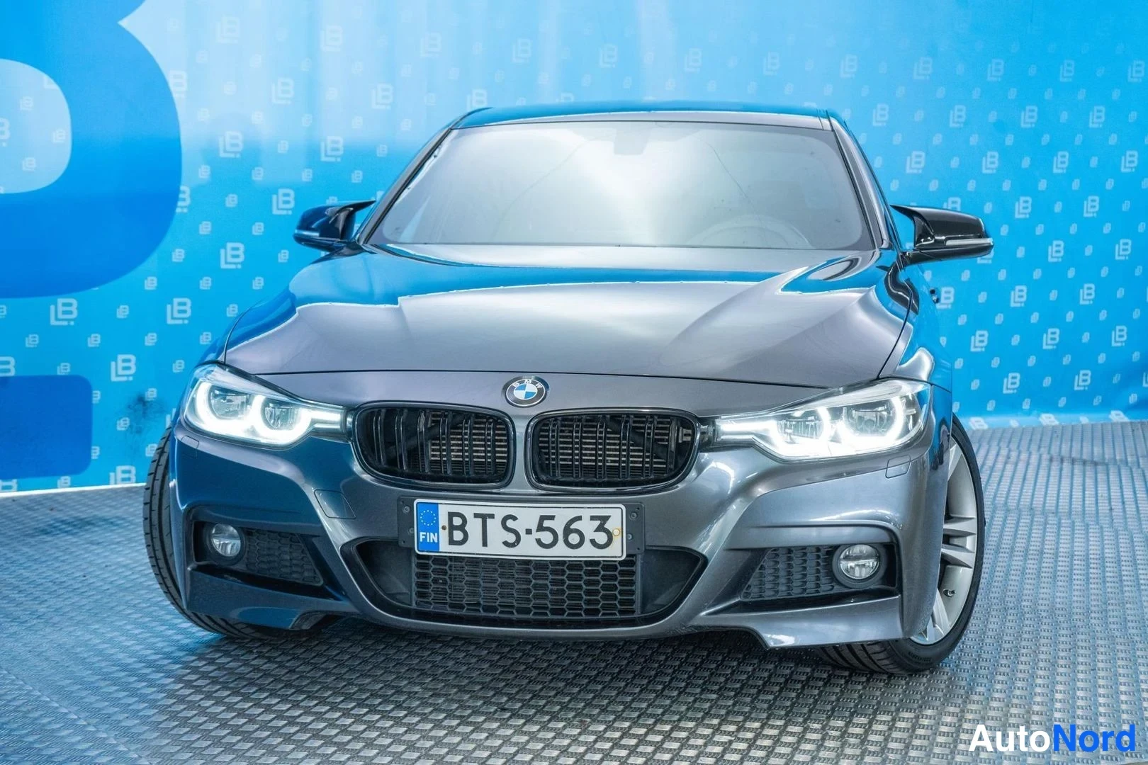 Grey BMW 330e 2017, front, photo 3