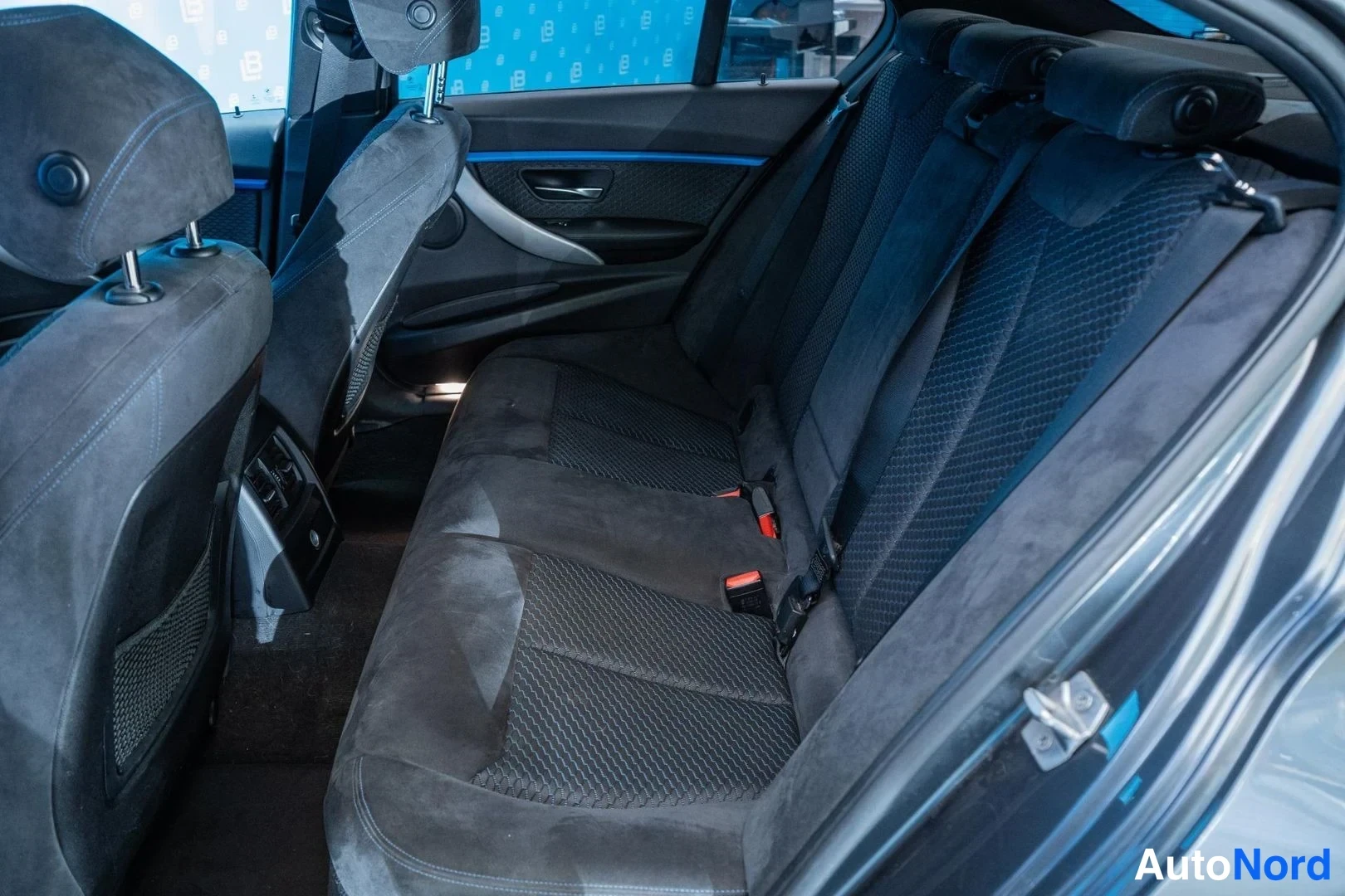 Grey BMW 330e 2017, rear seats, photo 12