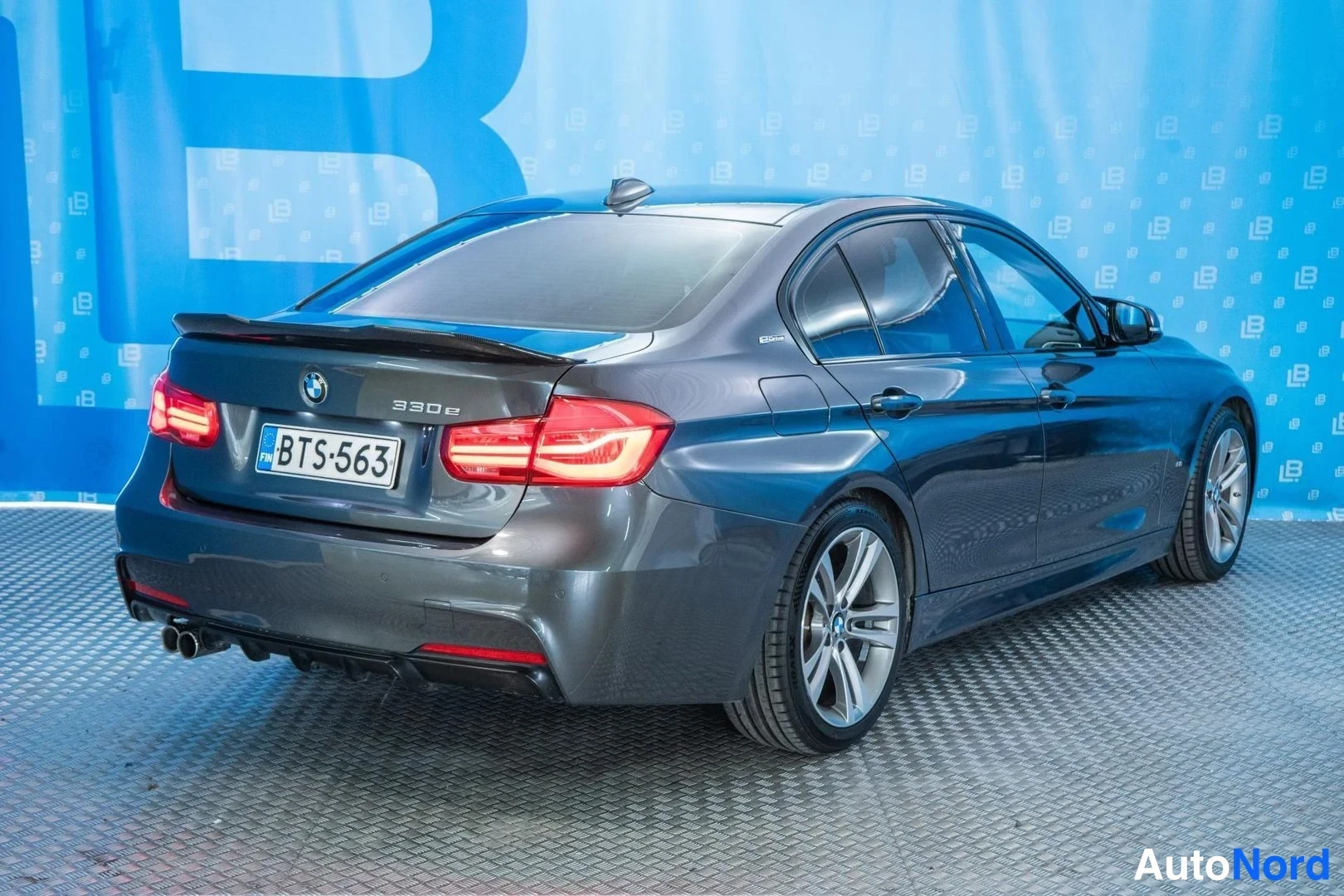 Grey BMW 330e 2017, rear three-quarter, photo 4