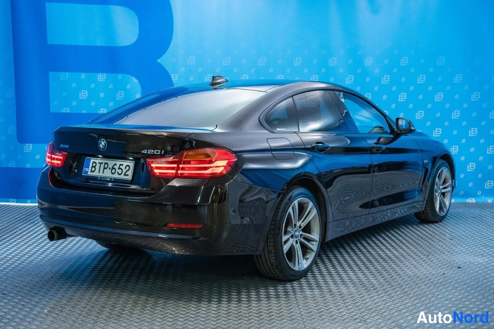 Black BMW 420i xDrive 2016, rear three-quarter, photo 4