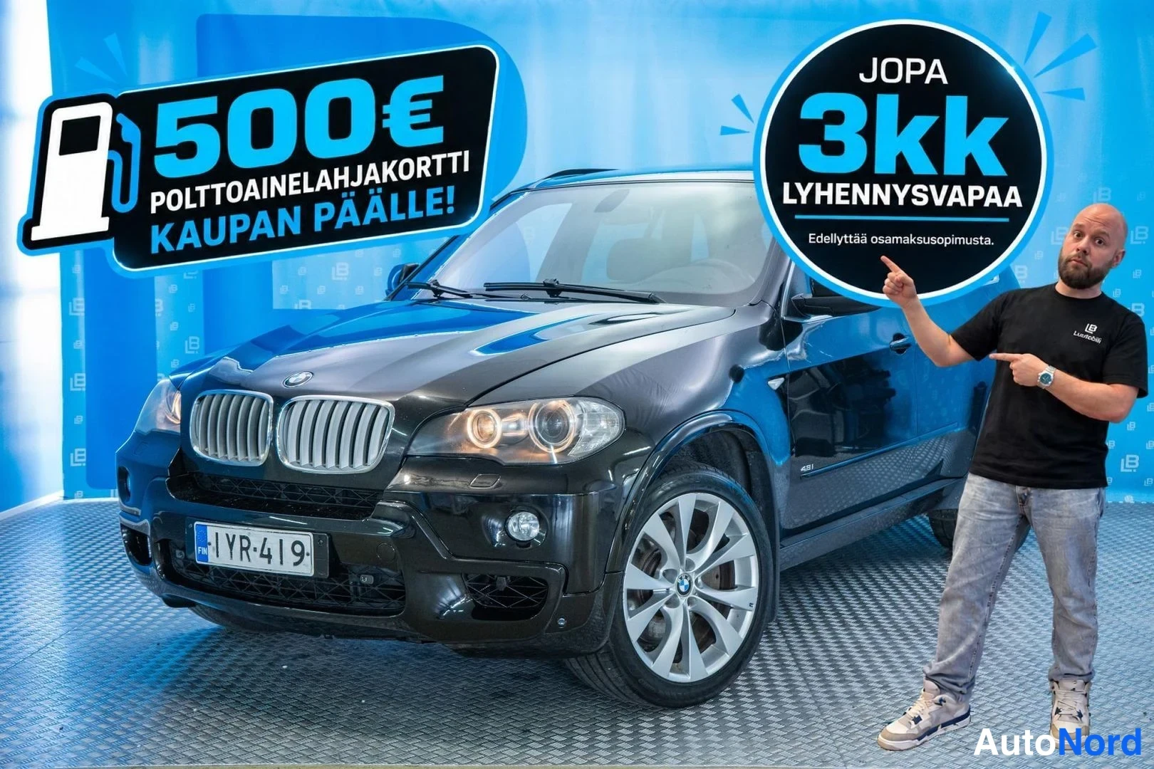 Black BMW X5 xDrive48i 2009, front three-quarter, nose to the left, photo 2