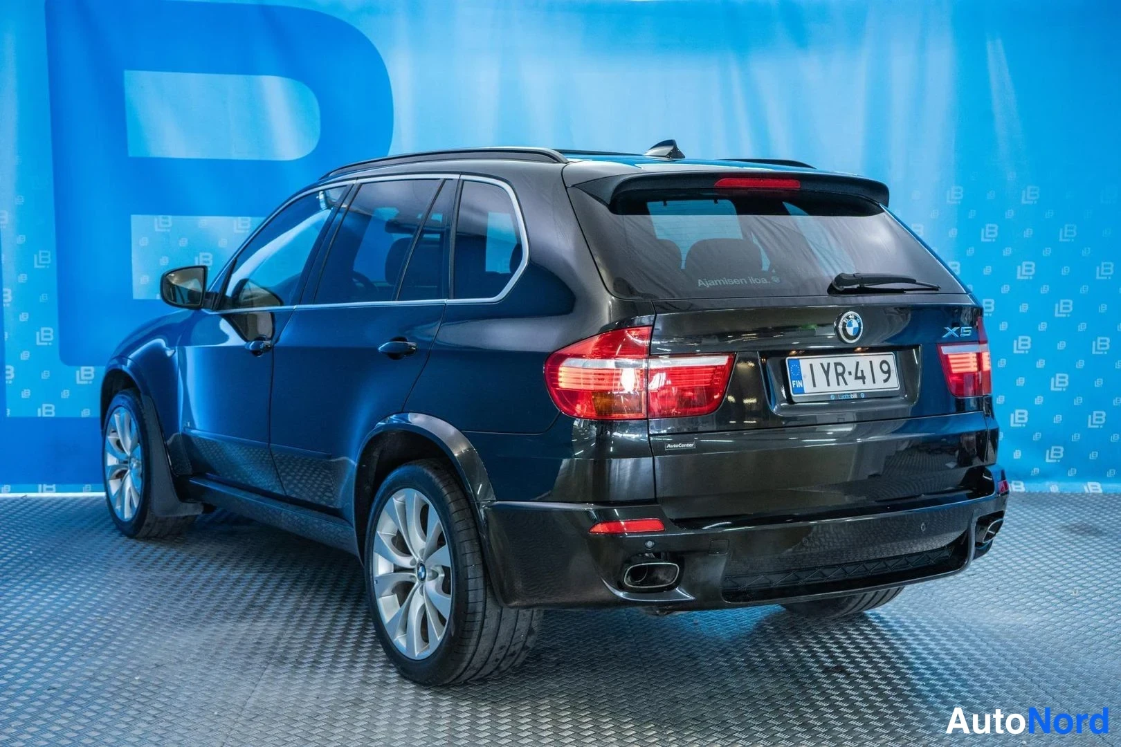 Black BMW X5 xDrive48i 2009, rear three-quarter, photo 5