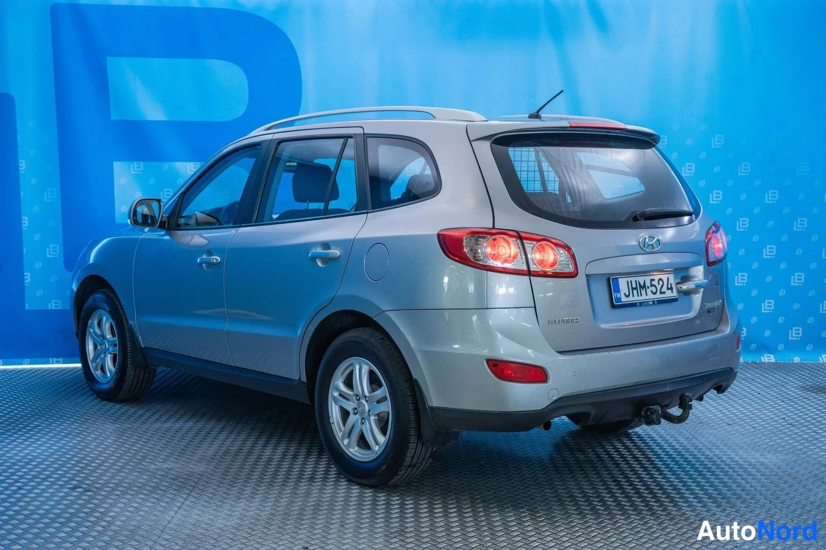Silver Hyundai Santa Fe 2011, rear three-quarter, photo 6