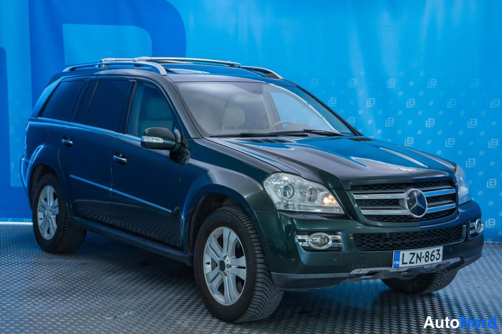 Green Mercedes-Benz GL 420 CDI 4MATIC 2008, front three-quarter, nose to the right, photo 3