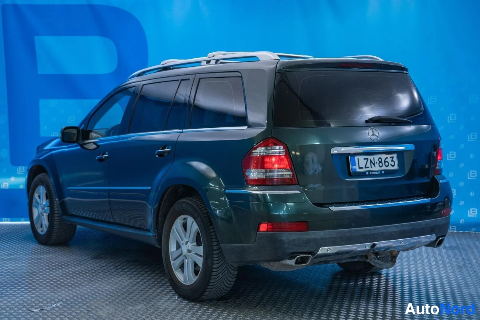 Green Mercedes-Benz GL 420 CDI 4MATIC 2008, rear three-quarter, photo 5