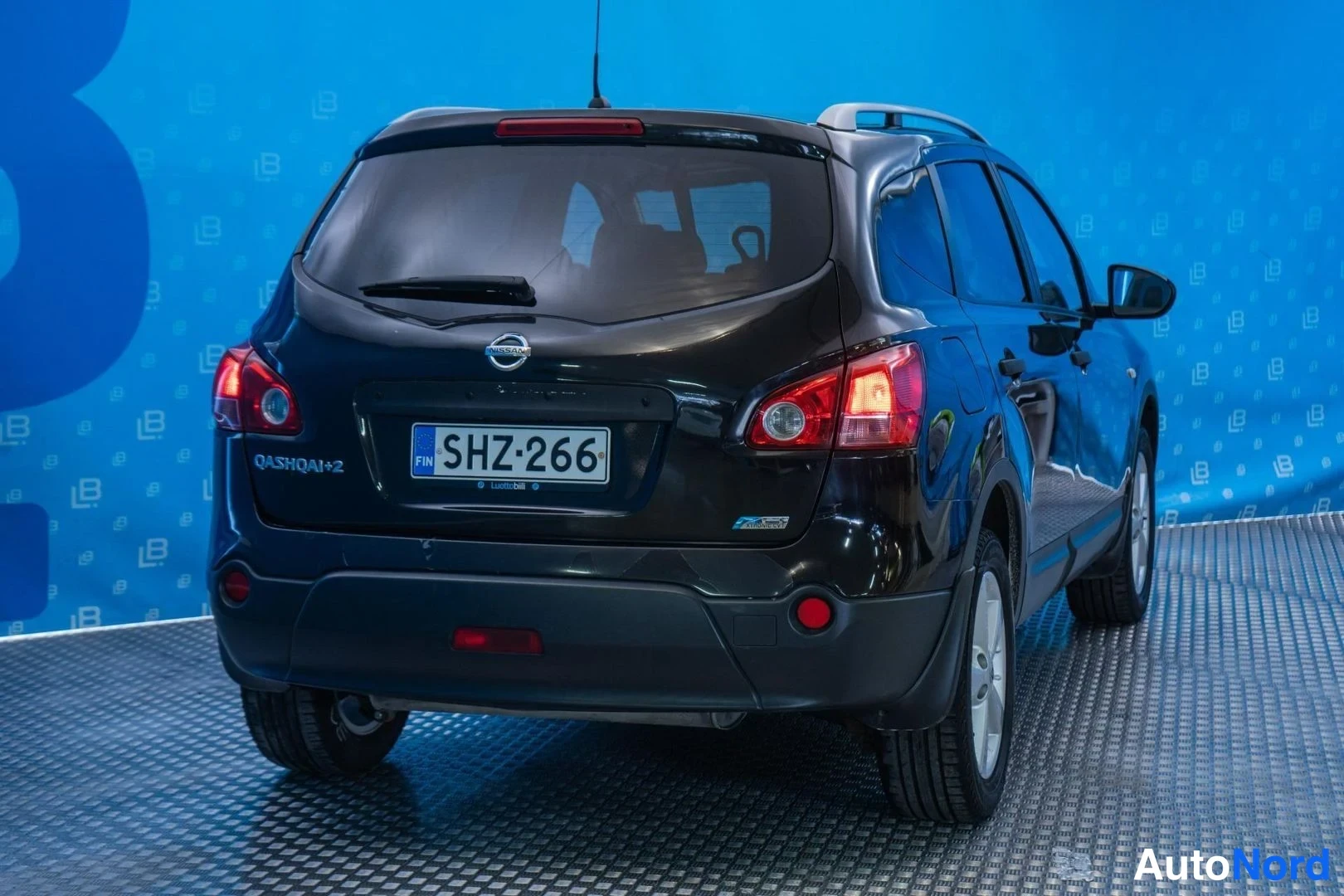 Black Nissan Qashqai+2 2009, rear three-quarter, photo 5