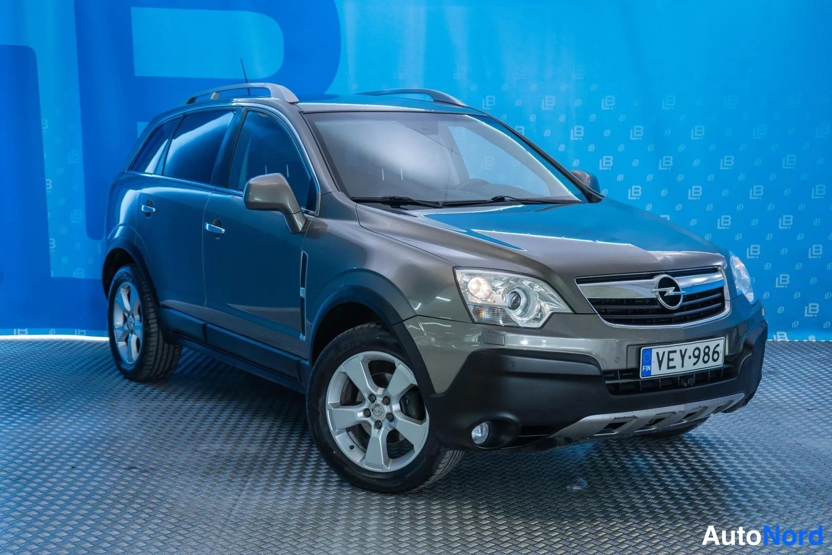 Brown Opel Antara 2007, front three-quarter, nose to the right, photo 2