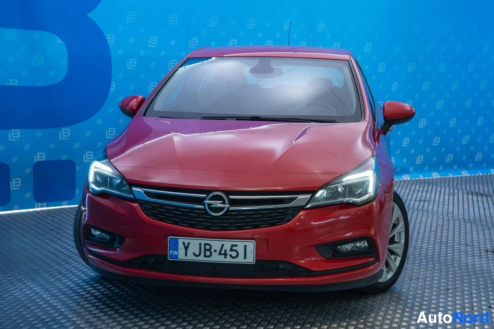 Red Opel Astra 2016, front, photo 3