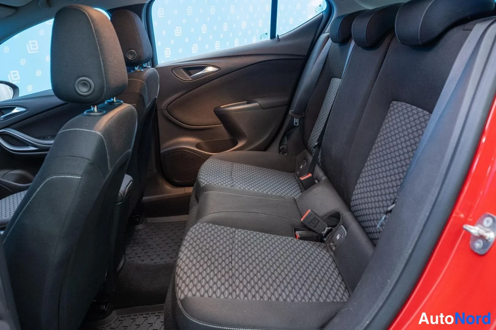 Red Opel Astra 2016, rear seats, photo 11