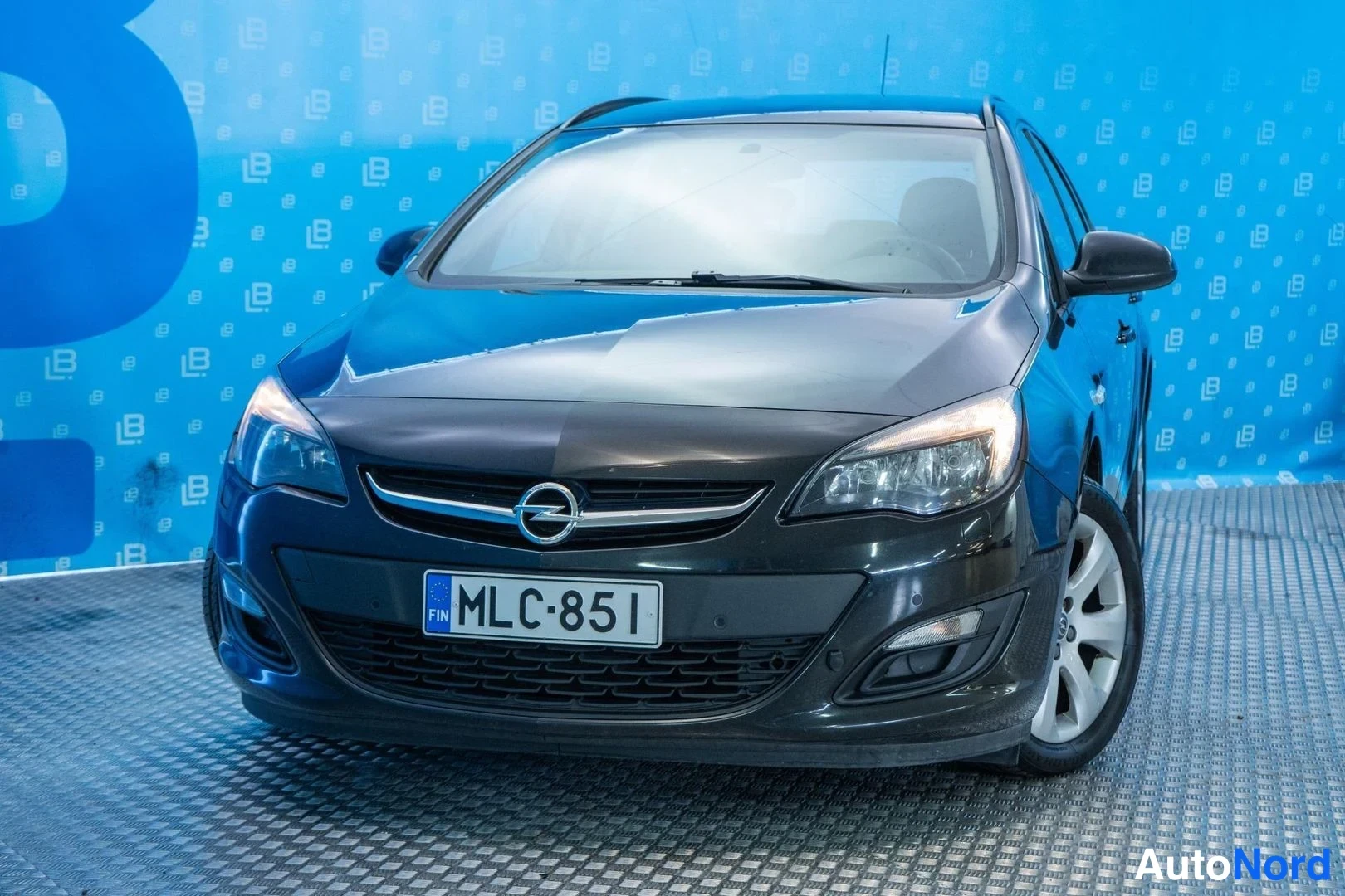 Black Opel Astra 2013, front, photo 3