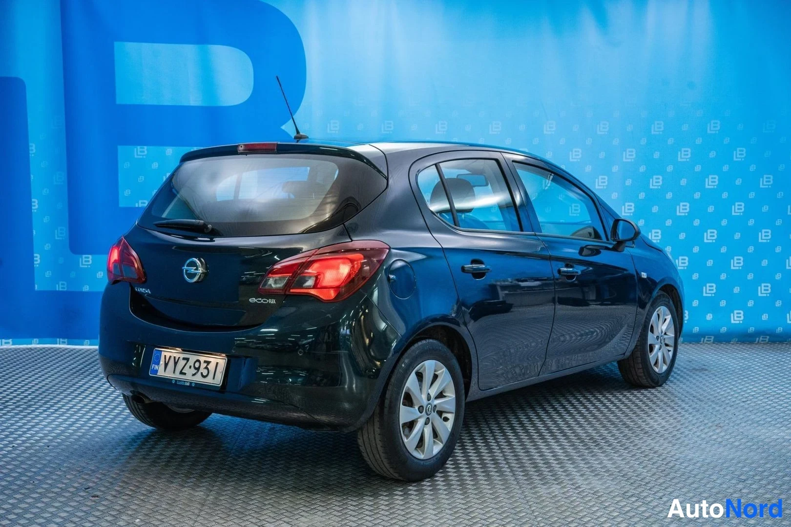 Green Opel Corsa 2016, rear three-quarter, photo 4