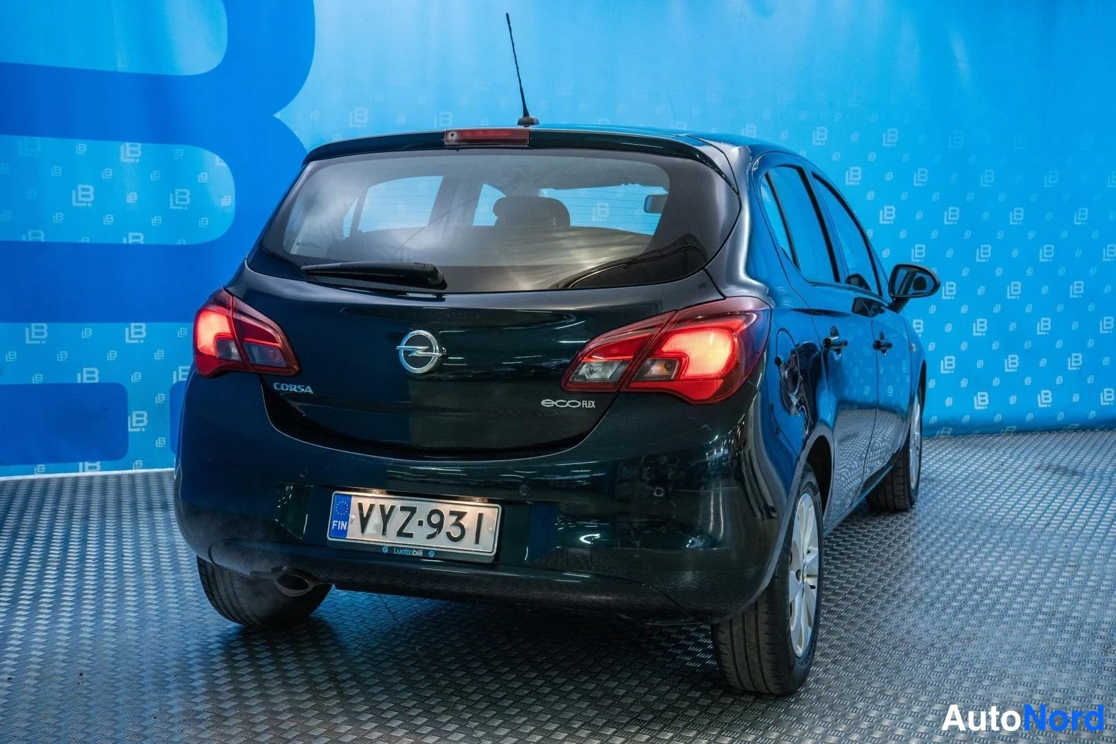 Green Opel Corsa 2016, rear three-quarter, photo 5
