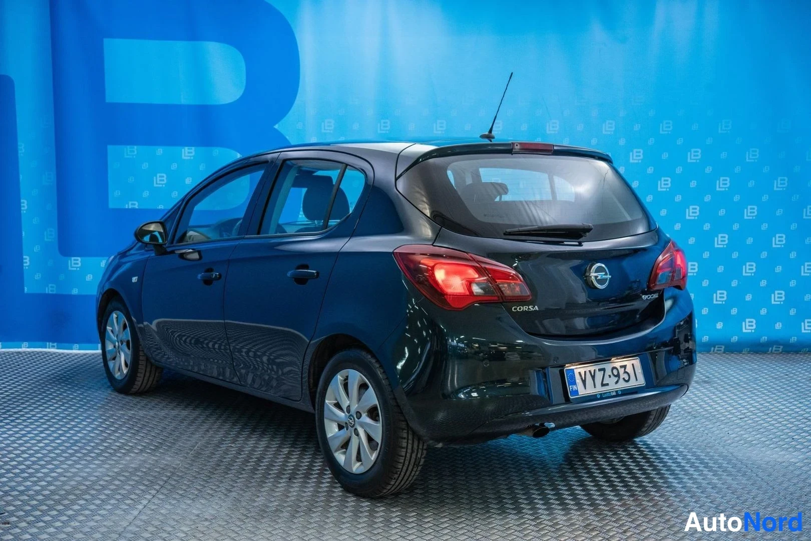 Green Opel Corsa 2016, rear three-quarter, photo 6