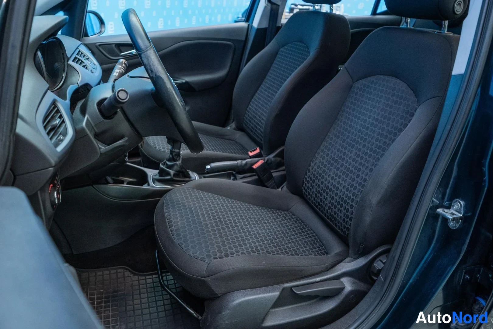 Green Opel Corsa 2016, front seats, photo 11