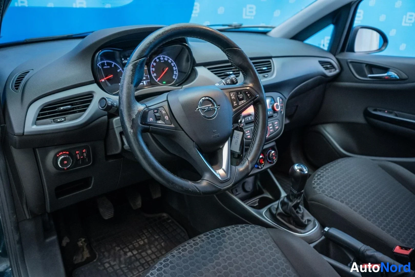 Green Opel Corsa 2016, cockpit, photo 7