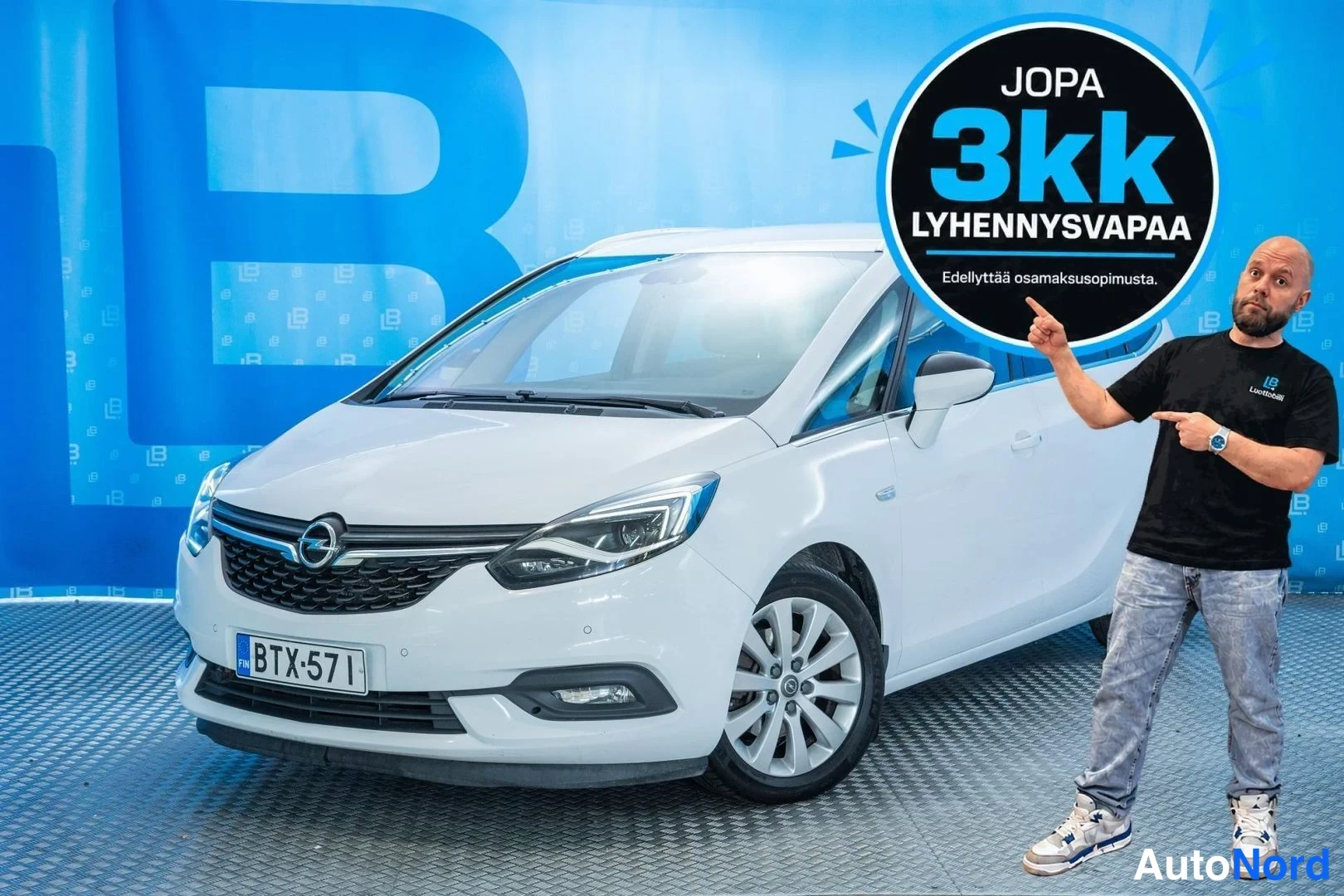 White Opel Zafira 2017, front three-quarter, nose to the left, photo 2
