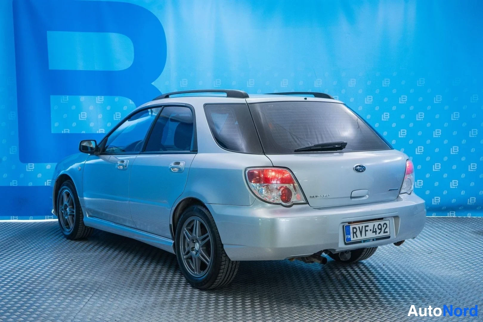 Silver Subaru Impreza 2007, rear three-quarter, photo 6