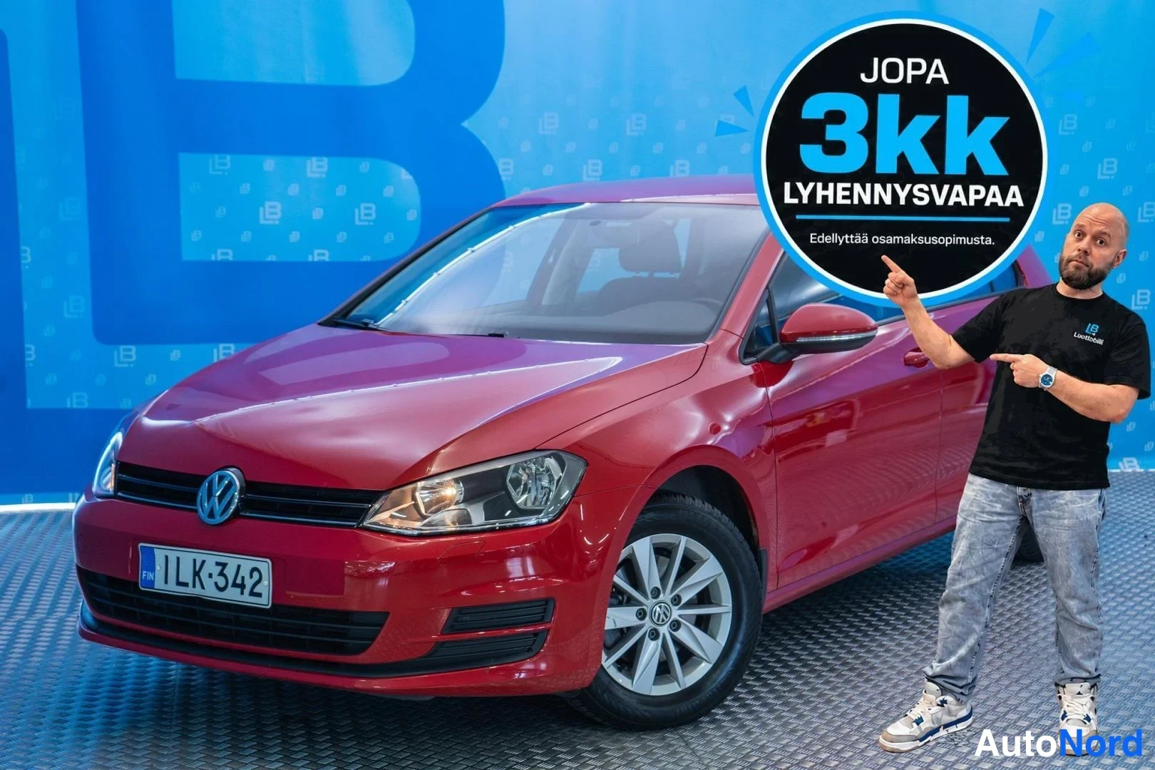 Red Volkswagen Golf 2014, front three-quarter, nose to the left, photo 2