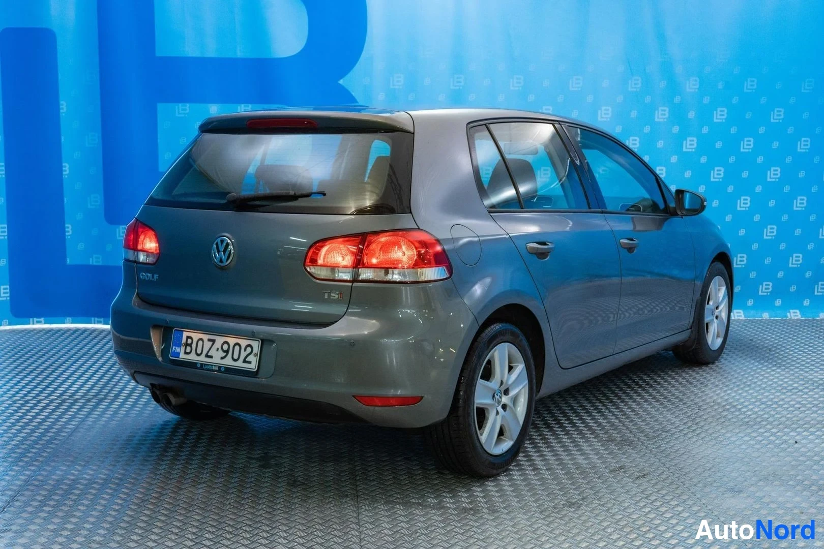 Grey Volkswagen Golf 2009, rear three-quarter, photo 4
