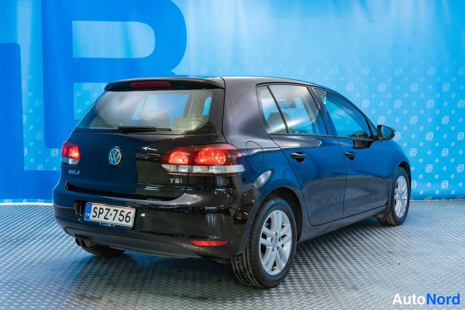 Black Volkswagen Golf 2010, rear three-quarter, photo 4