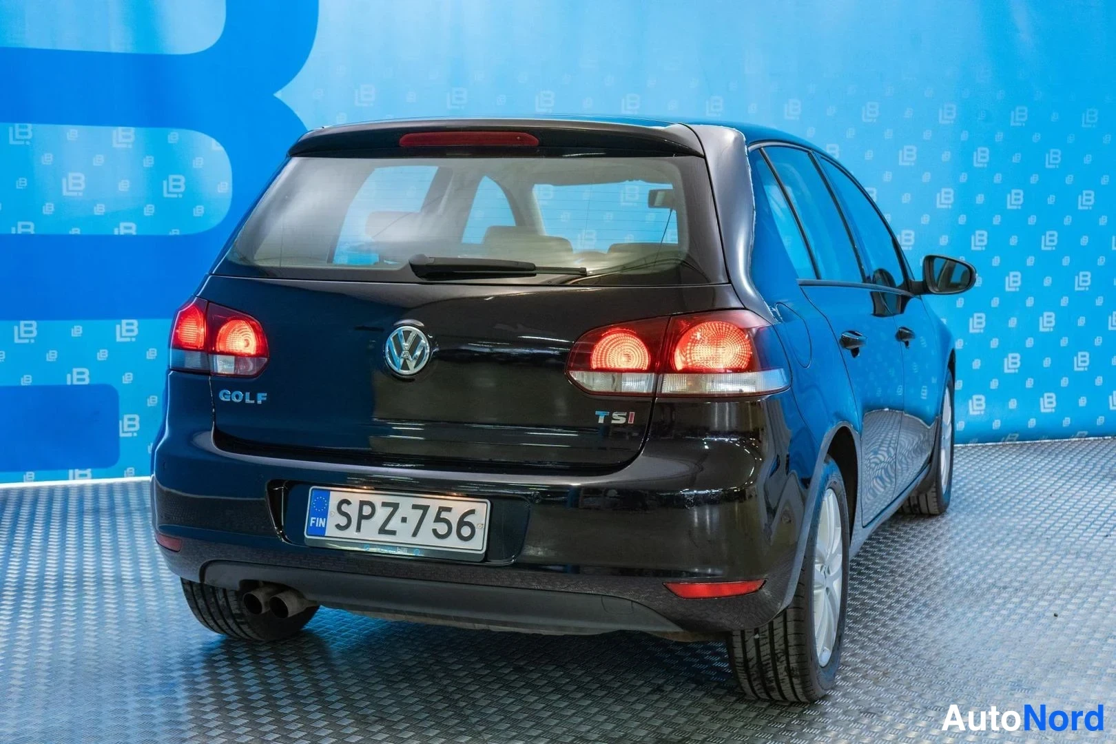 Black Volkswagen Golf 2010, rear three-quarter, photo 5