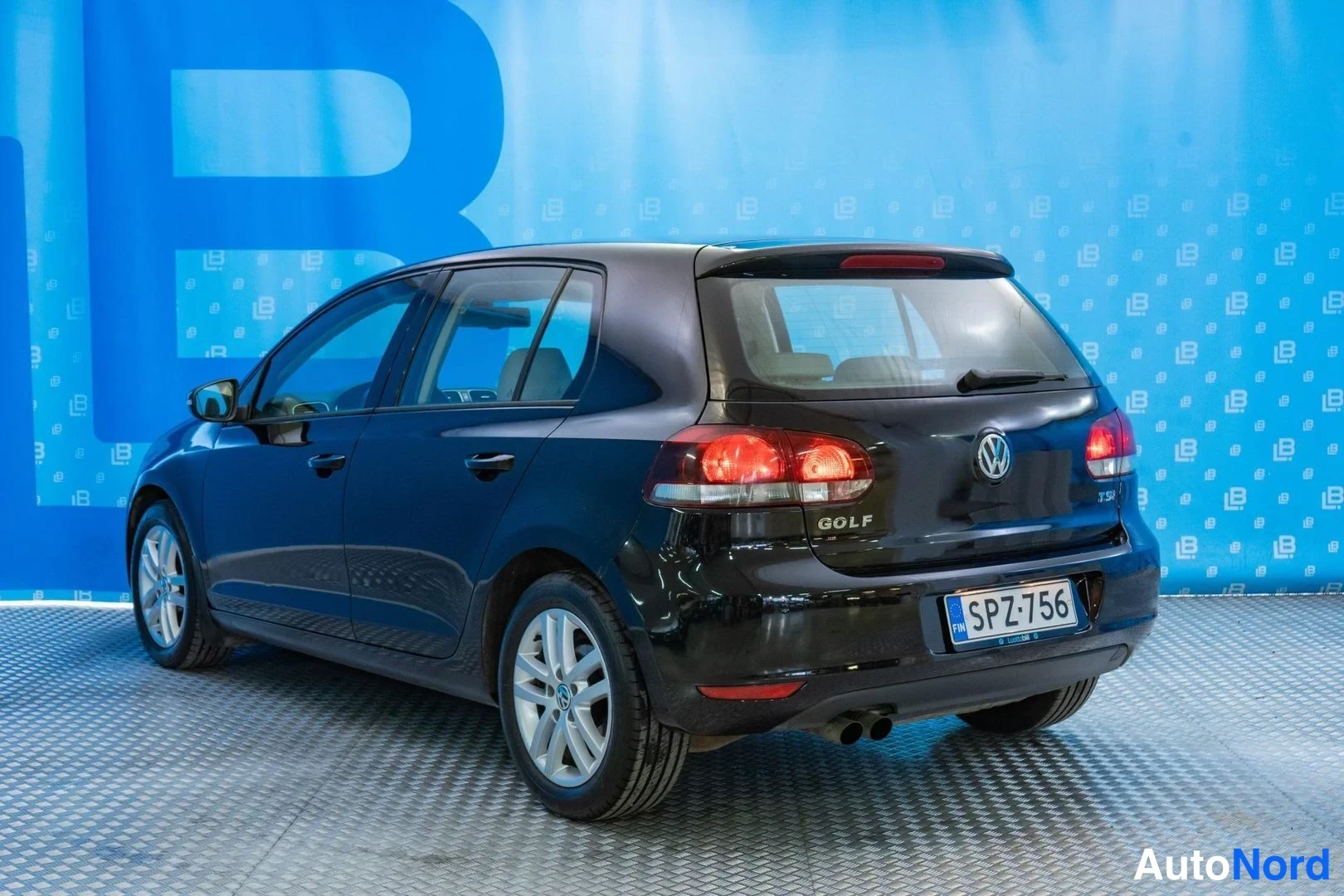 Black Volkswagen Golf 2010, rear three-quarter, photo 6