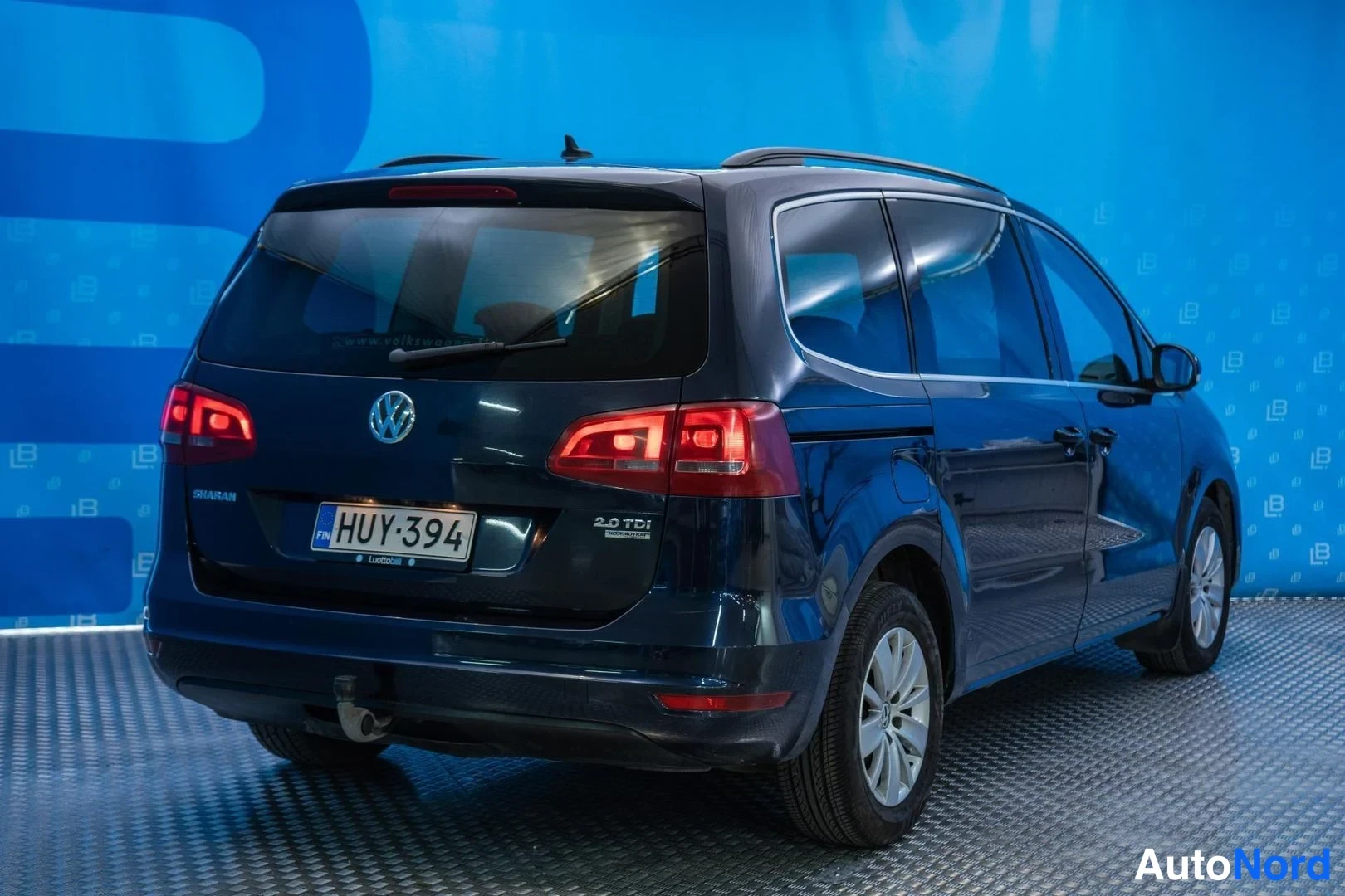 Blue Volkswagen Sharan 2011, rear three-quarter, photo 4