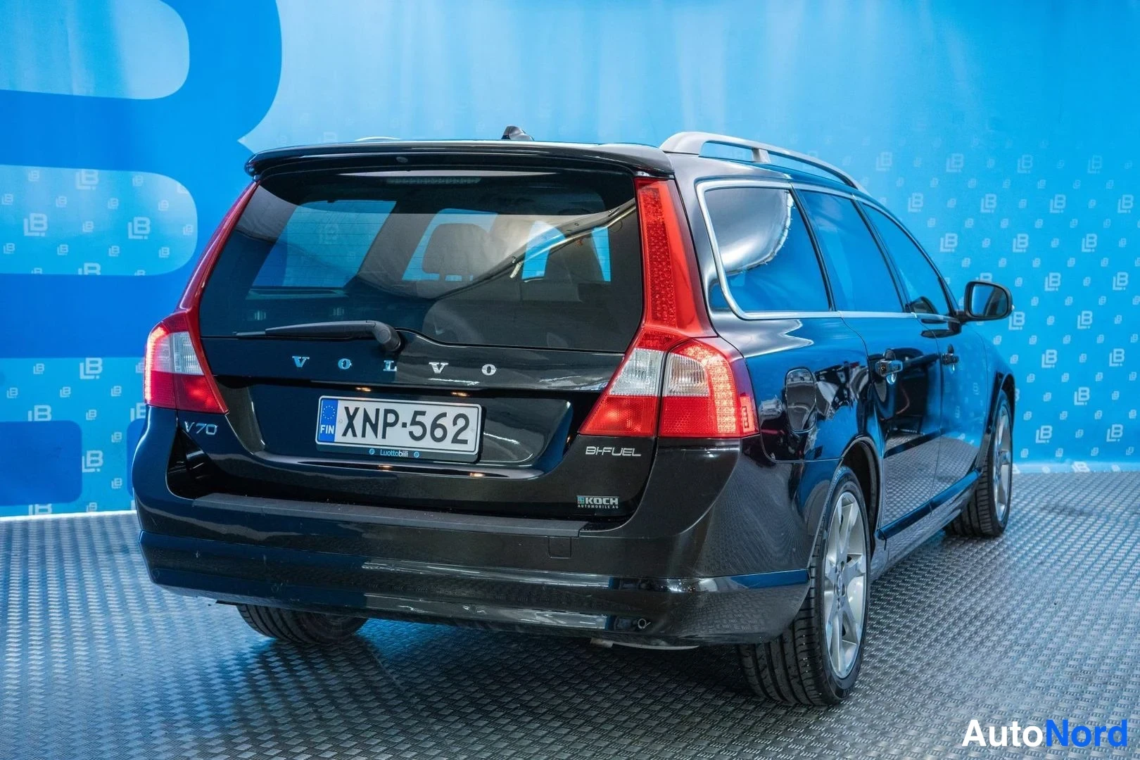 Black Volvo V70 2012, rear three-quarter, photo 4