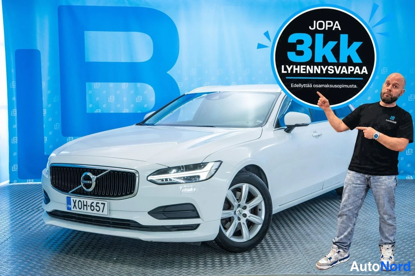 White Volvo V90 2017, front three-quarter, nose to the left, photo 2